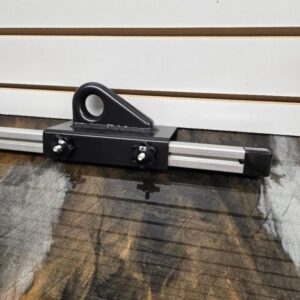 Mounting bracket on wooden and white background.