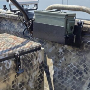 Boat interior with Garmin device and camo pattern.
